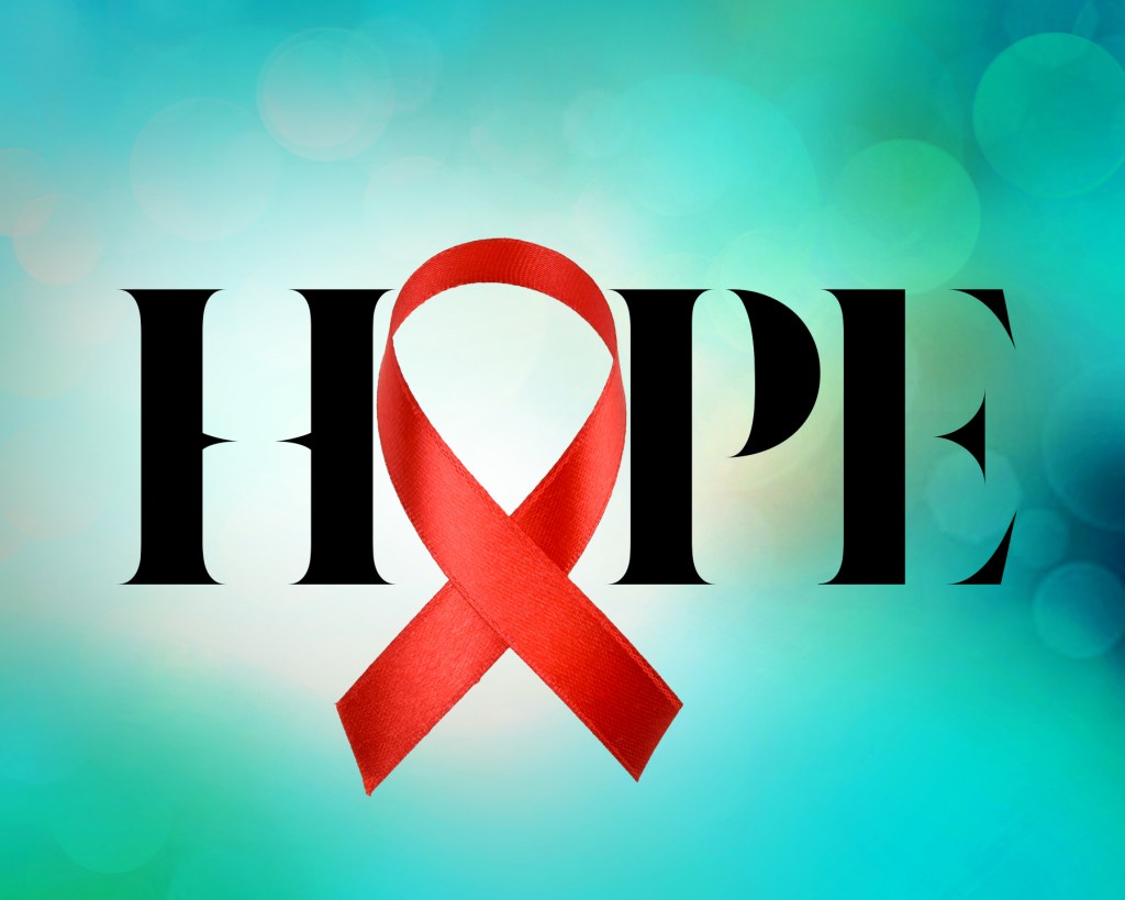 The word 'HOPE' in bold letters, with a red ribbon symbol for HIV/AIDS awareness integrated into the letter 'O', set against a soft, colorful background.